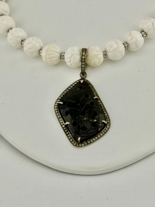 Carved Tridacna Shell and Swarovski Crystal Necklace with Carved Sapphire Pendant