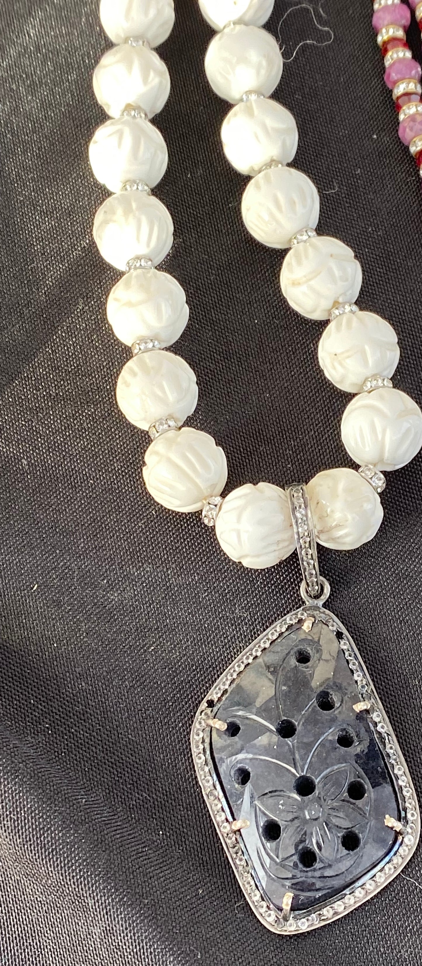 Carved Tridacna Shell and Swarovski Crystal Necklace with Carved Sapphire Pendant